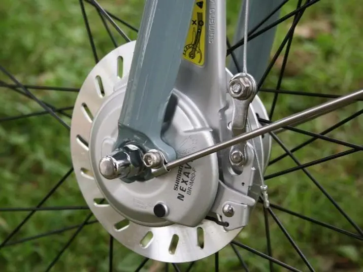 Тормозной диск на колесе велосипеда. Тормоз роллерный Shimano c6000 передний. Передний роллерный тормоз c3000. Барабанные роллерные тормоза велосипеда. Роллерный тормоз задний.