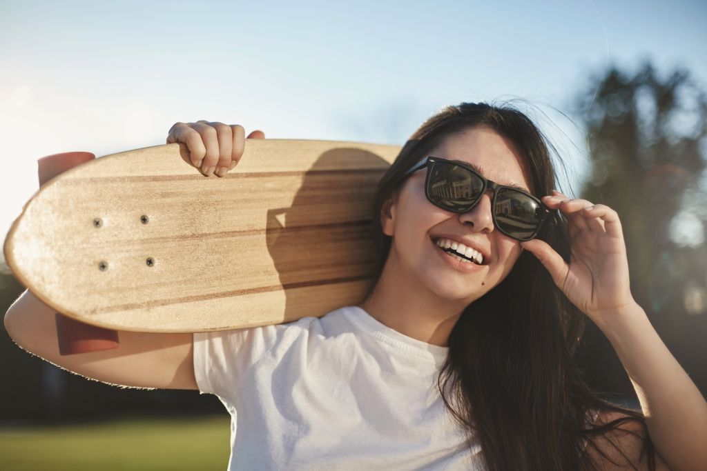 emotions-youth-and-city-skateboarding-concept-close-up-cheerfu.jpg